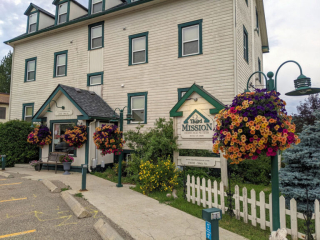 Summer-Flowers--third-mission-suites Front entrance of the Third Mission Heritage Suites